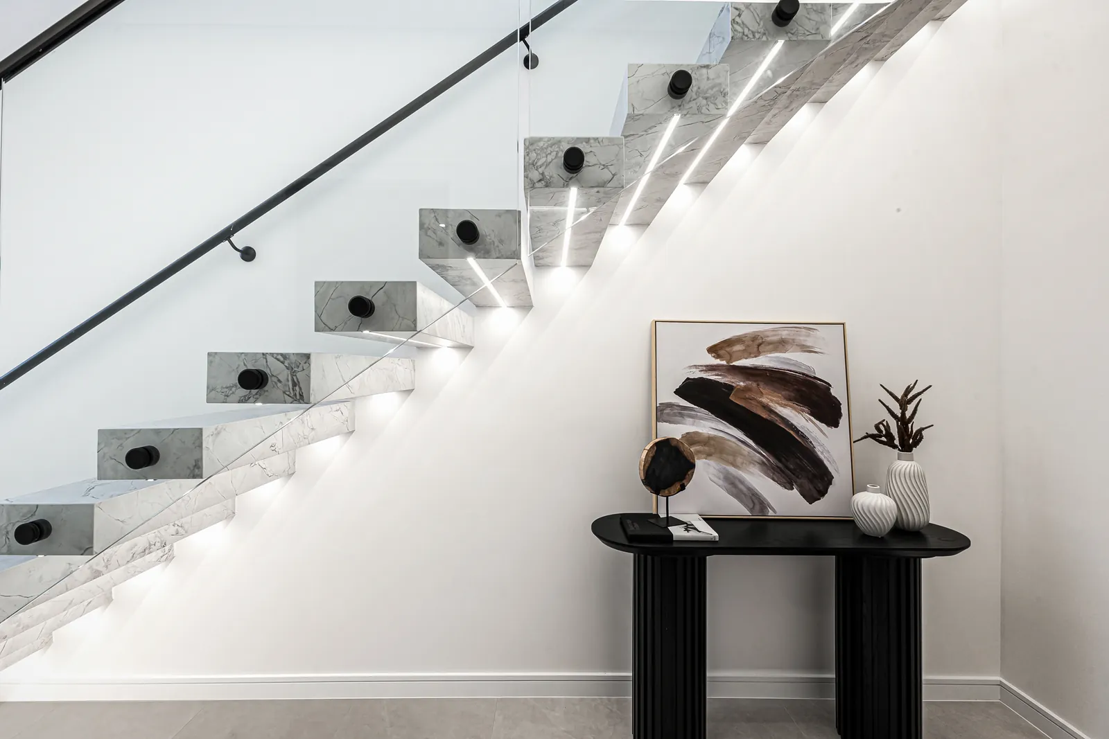 Floating timber staircase with concealed LED strip lighting
